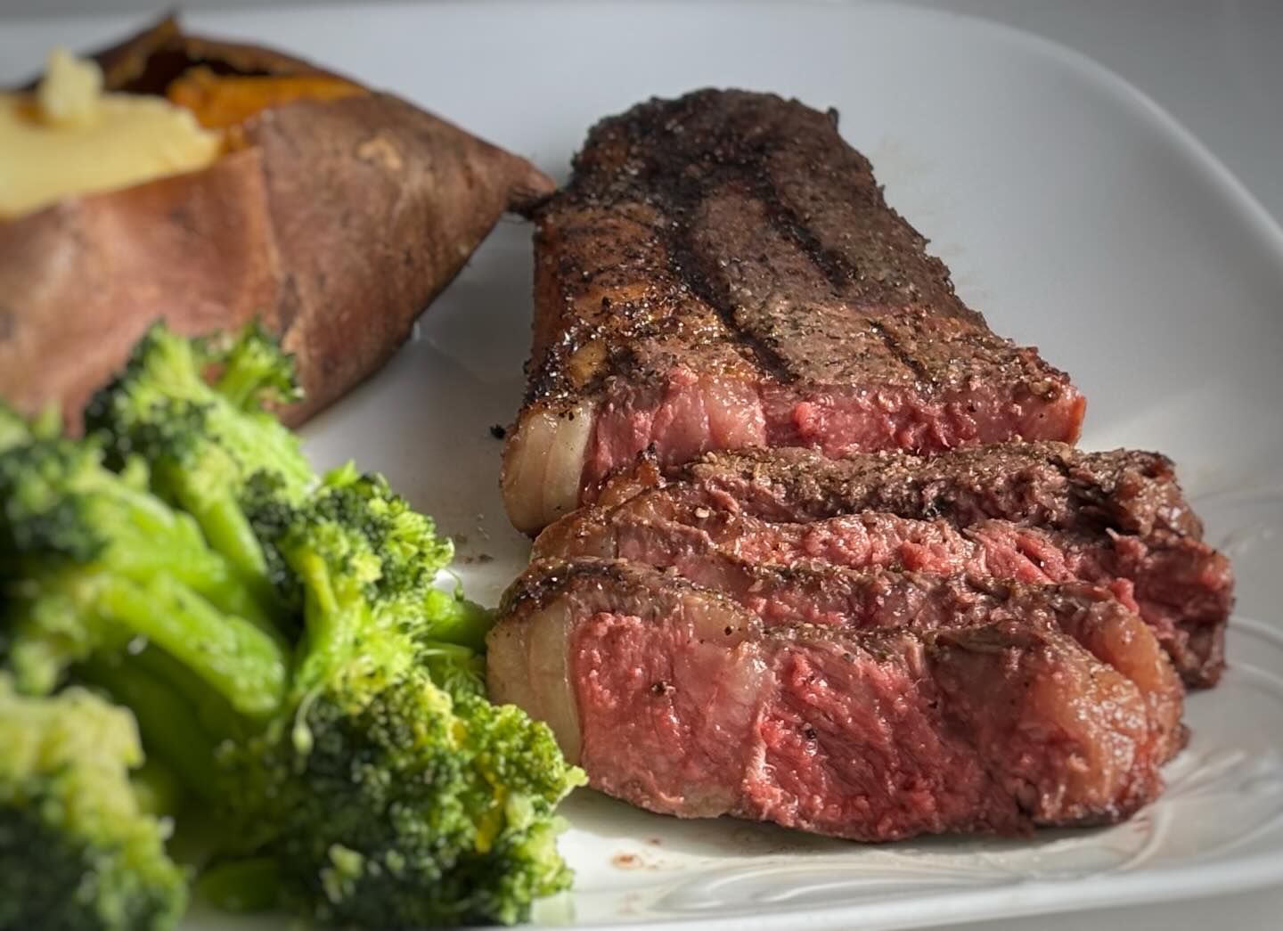 Sliced steak dinner from Crossroads Meats